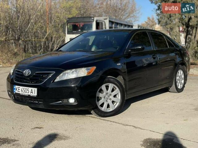 Черный Тойота Камри, объемом двигателя 2.4 л и пробегом 244 тыс. км за 8700 $, фото 2 на Automoto.ua