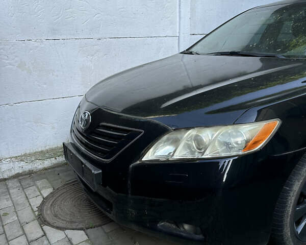 Чорний Тойота Камрі, об'ємом двигуна 2.36 л та пробігом 340 тис. км за 10500 $, фото 16 на Automoto.ua