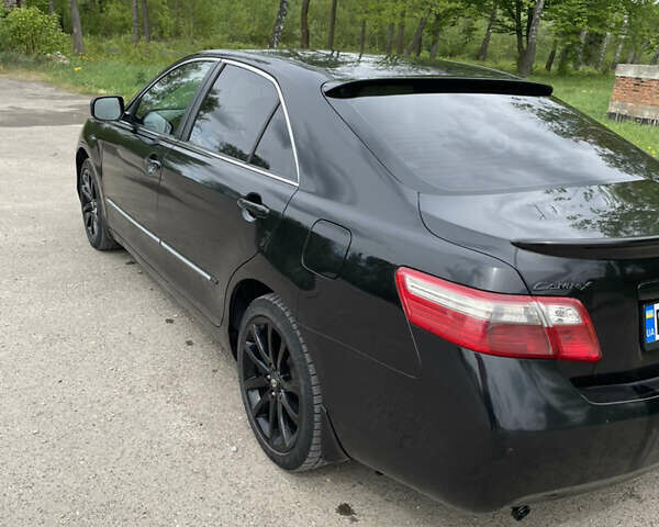 Чорний Тойота Камрі, об'ємом двигуна 2.36 л та пробігом 310 тис. км за 8500 $, фото 7 на Automoto.ua