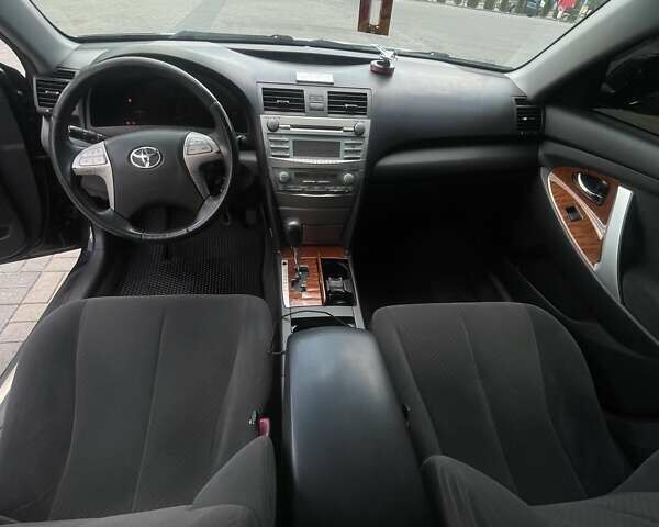 Черный Тойота Камри, объемом двигателя 2.36 л и пробегом 253 тыс. км за 9600 $, фото 7 на Automoto.ua