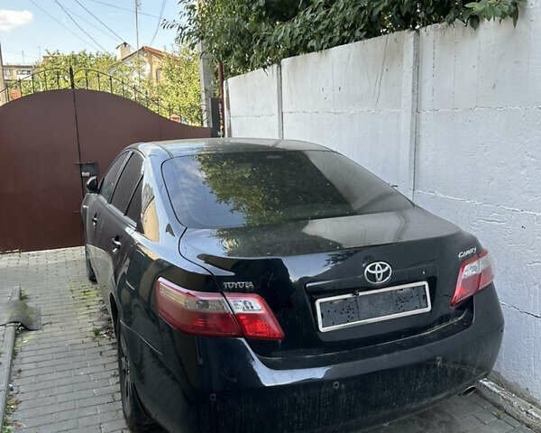Чорний Тойота Камрі, об'ємом двигуна 2.36 л та пробігом 340 тис. км за 10500 $, фото 2 на Automoto.ua