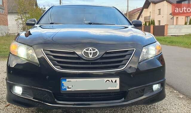 Черный Тойота Камри, объемом двигателя 2.4 л и пробегом 173 тыс. км за 7999 $, фото 4 на Automoto.ua