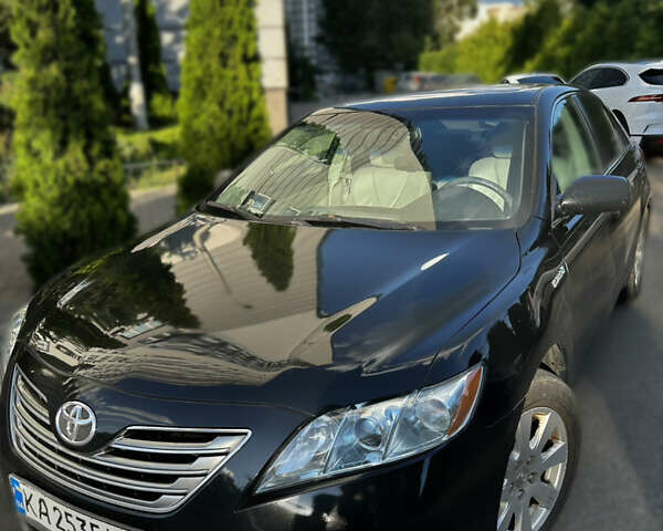 Черный Тойота Камри, объемом двигателя 2.4 л и пробегом 264 тыс. км за 9000 $, фото 1 на Automoto.ua