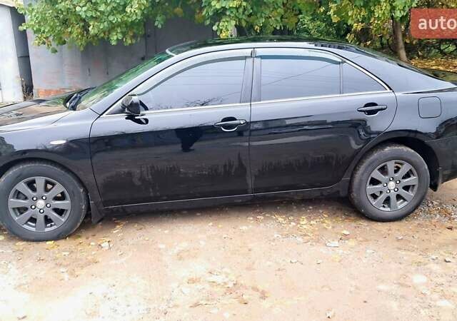 Черный Тойота Камри, объемом двигателя 2.36 л и пробегом 355 тыс. км за 7300 $, фото 3 на Automoto.ua