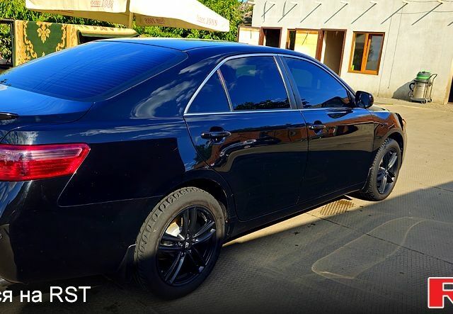 Черный Тойота Камри, объемом двигателя 2.4 л и пробегом 233 тыс. км за 8500 $, фото 3 на Automoto.ua