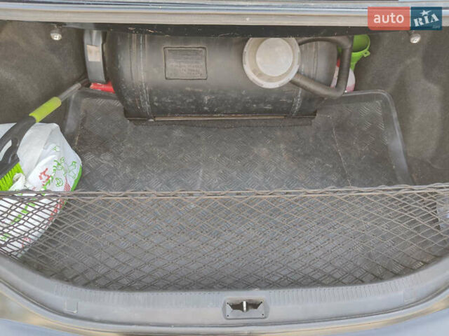 Черный Тойота Камри, объемом двигателя 2.4 л и пробегом 267 тыс. км за 8200 $, фото 19 на Automoto.ua