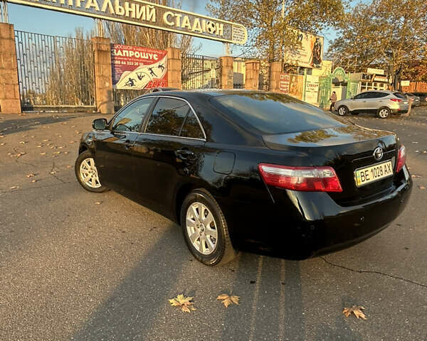 Черный Тойота Камри, объемом двигателя 2.4 л и пробегом 263 тыс. км за 8500 $, фото 11 на Automoto.ua