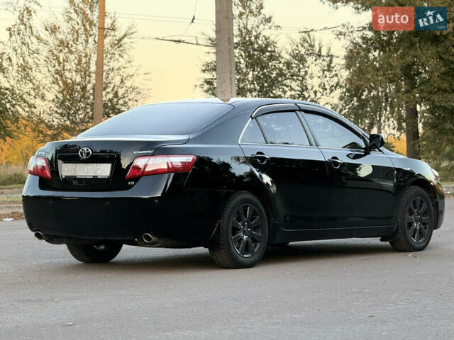 Чорний Тойота Камрі, об'ємом двигуна 3.46 л та пробігом 225 тис. км за 10300 $, фото 4 на Automoto.ua