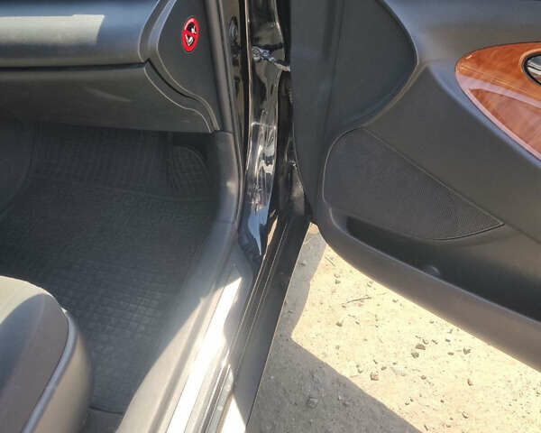 Черный Тойота Камри, объемом двигателя 2.4 л и пробегом 267 тыс. км за 8200 $, фото 13 на Automoto.ua