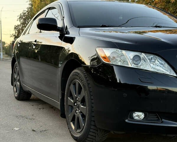 Чорний Тойота Камрі, об'ємом двигуна 3.46 л та пробігом 225 тис. км за 10300 $, фото 49 на Automoto.ua