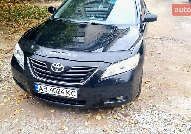 Черный Тойота Камри, объемом двигателя 2.36 л и пробегом 355 тыс. км за 7300 $, фото 1 на Automoto.ua