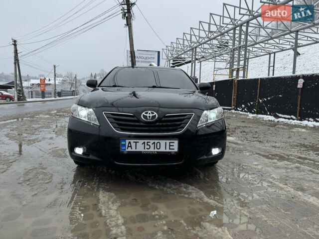 Чорний Тойота Камрі, об'ємом двигуна 2.4 л та пробігом 260 тис. км за 10500 $, фото 1 на Automoto.ua