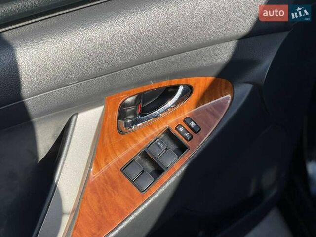 Черный Тойота Камри, объемом двигателя 2.4 л и пробегом 244 тыс. км за 8700 $, фото 18 на Automoto.ua