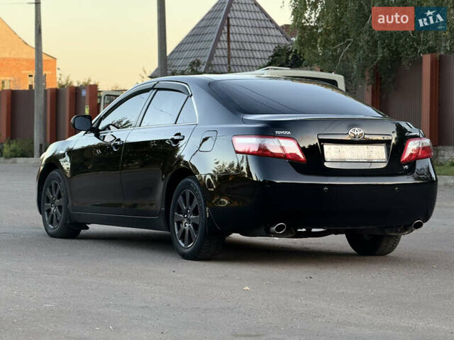 Чорний Тойота Камрі, об'ємом двигуна 3.46 л та пробігом 225 тис. км за 10300 $, фото 3 на Automoto.ua