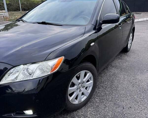 Черный Тойота Камри, объемом двигателя 2.4 л и пробегом 240 тыс. км за 8700 $, фото 2 на Automoto.ua