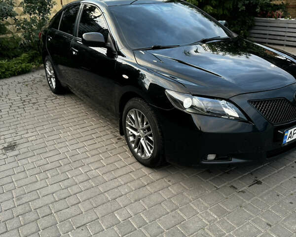 Чорний Тойота Камрі, об'ємом двигуна 3.46 л та пробігом 375 тис. км за 7500 $, фото 1 на Automoto.ua