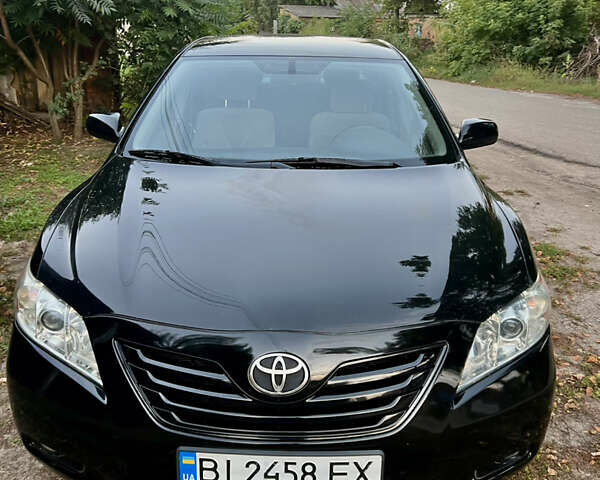 Чорний Тойота Камрі, об'ємом двигуна 2.36 л та пробігом 195 тис. км за 7850 $, фото 3 на Automoto.ua