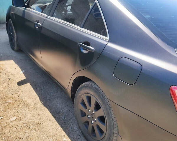 Черный Тойота Камри, объемом двигателя 2.4 л и пробегом 267 тыс. км за 8200 $, фото 8 на Automoto.ua