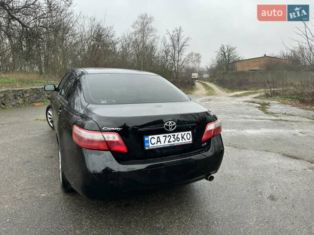 Черный Тойота Камри, объемом двигателя 2.4 л и пробегом 232 тыс. км за 6850 $, фото 4 на Automoto.ua