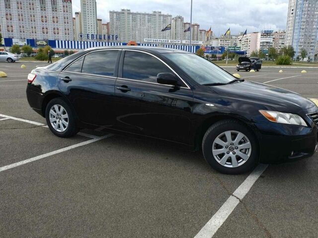Чорний Тойота Камрі, об'ємом двигуна 2.4 л та пробігом 261 тис. км за 8300 $, фото 1 на Automoto.ua