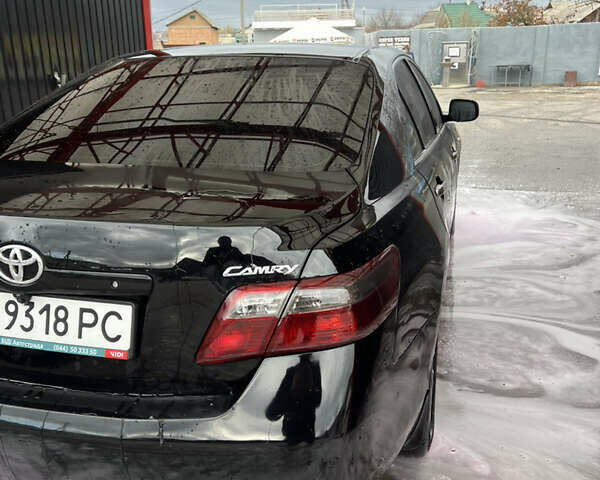 Черный Тойота Камри, объемом двигателя 2.36 л и пробегом 27 тыс. км за 7800 $, фото 1 на Automoto.ua