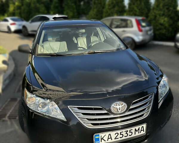 Черный Тойота Камри, объемом двигателя 2.4 л и пробегом 264 тыс. км за 9000 $, фото 2 на Automoto.ua