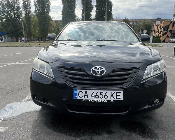 Черный Тойота Камри, объемом двигателя 2.36 л и пробегом 283 тыс. км за 8199 $, фото 1 на Automoto.ua
