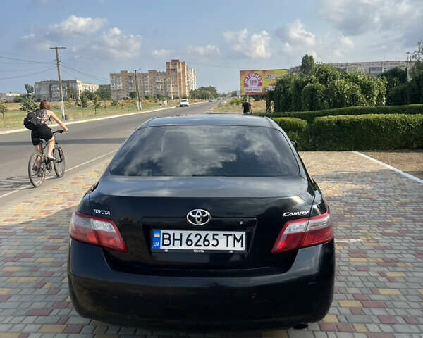 Черный Тойота Камри, объемом двигателя 2.36 л и пробегом 260 тыс. км за 7800 $, фото 1 на Automoto.ua