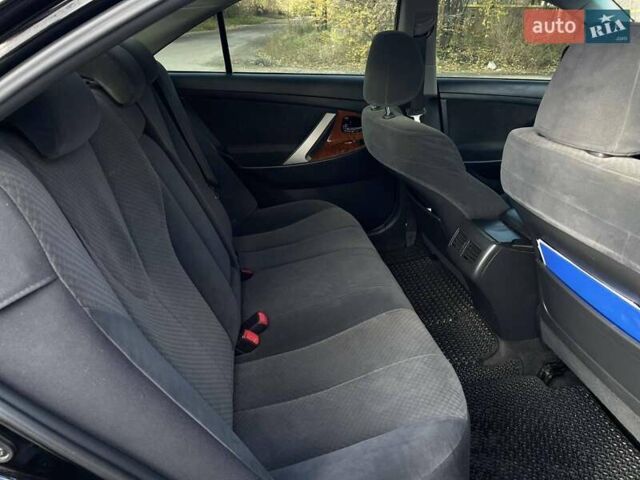 Черный Тойота Камри, объемом двигателя 2.4 л и пробегом 244 тыс. км за 8700 $, фото 21 на Automoto.ua