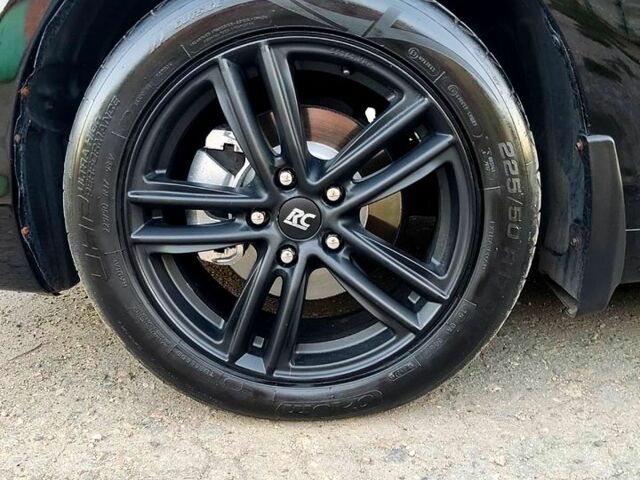 Чорний Тойота Камрі, об'ємом двигуна 2.4 л та пробігом 235 тис. км за 8700 $, фото 6 на Automoto.ua