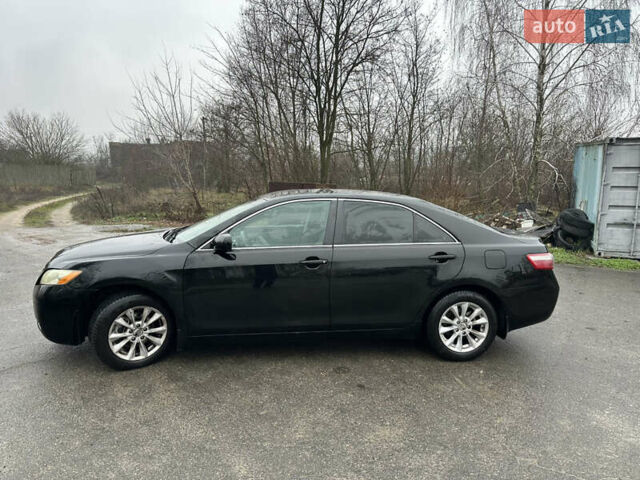 Черный Тойота Камри, объемом двигателя 2.4 л и пробегом 232 тыс. км за 6850 $, фото 1 на Automoto.ua