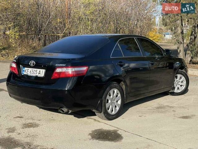 Черный Тойота Камри, объемом двигателя 2.4 л и пробегом 244 тыс. км за 8700 $, фото 5 на Automoto.ua