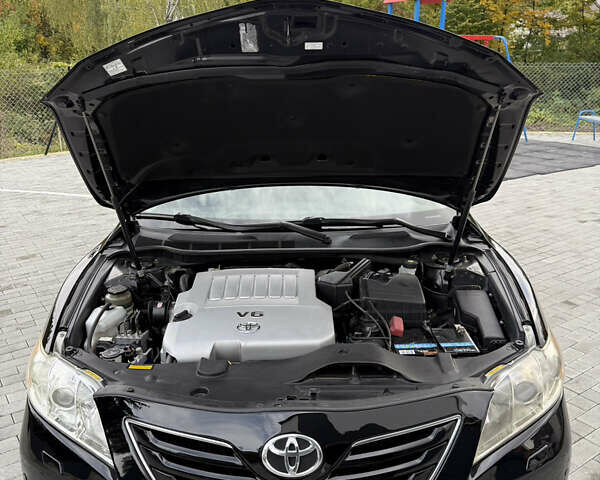 Черный Тойота Камри, объемом двигателя 3.5 л и пробегом 246 тыс. км за 11000 $, фото 54 на Automoto.ua