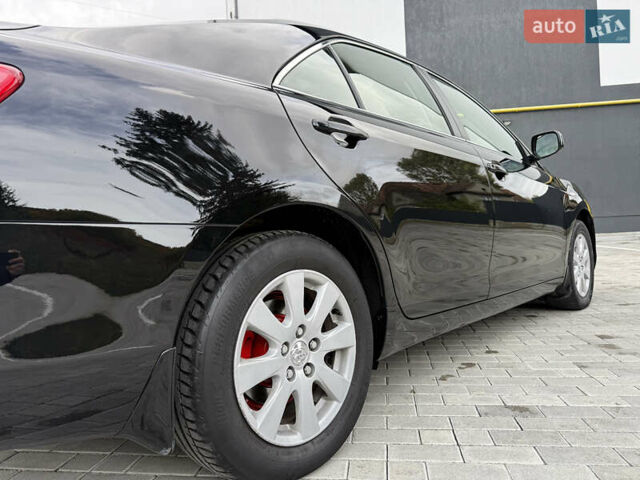 Черный Тойота Камри, объемом двигателя 3.5 л и пробегом 246 тыс. км за 11000 $, фото 22 на Automoto.ua