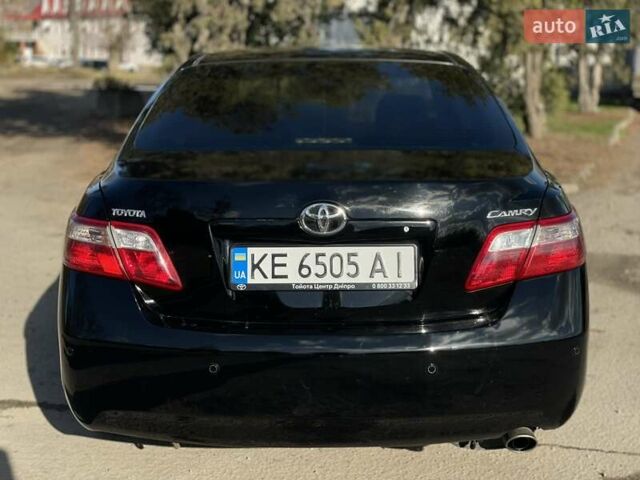 Черный Тойота Камри, объемом двигателя 2.4 л и пробегом 244 тыс. км за 8700 $, фото 7 на Automoto.ua