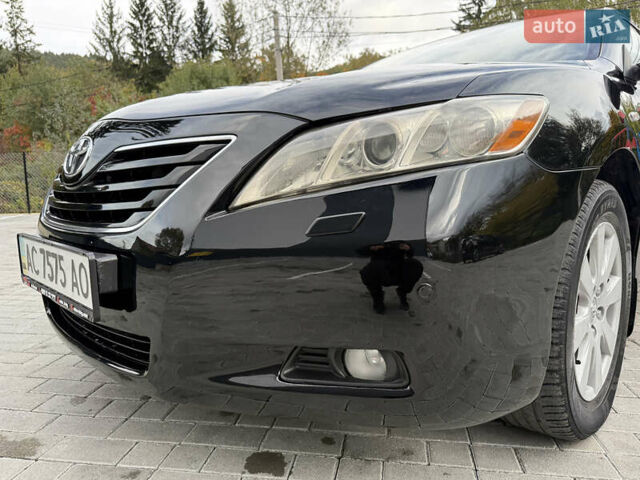 Черный Тойота Камри, объемом двигателя 3.5 л и пробегом 246 тыс. км за 11000 $, фото 25 на Automoto.ua
