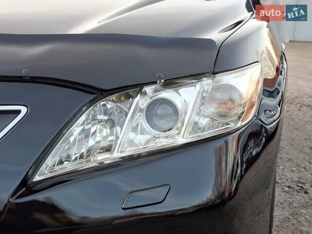 Чорний Тойота Камрі, об'ємом двигуна 3.46 л та пробігом 294 тис. км за 8800 $, фото 7 на Automoto.ua