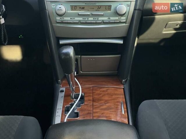 Черный Тойота Камри, объемом двигателя 2.4 л и пробегом 244 тыс. км за 8700 $, фото 19 на Automoto.ua