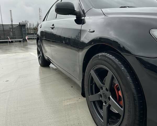 Черный Тойота Камри, объемом двигателя 3.46 л и пробегом 390 тыс. км за 11700 $, фото 19 на Automoto.ua