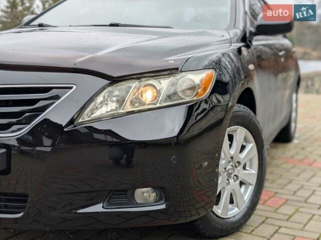 Черный Тойота Камри, объемом двигателя 2.4 л и пробегом 238 тыс. км за 7699 $, фото 2 на Automoto.ua