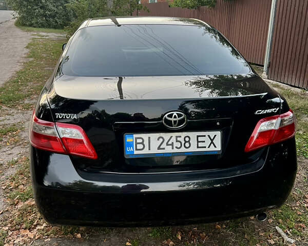 Чорний Тойота Камрі, об'ємом двигуна 2.36 л та пробігом 195 тис. км за 7850 $, фото 5 на Automoto.ua