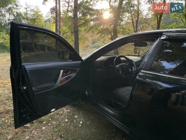 Черный Тойота Камри, объемом двигателя 2.36 л и пробегом 164 тыс. км за 8900 $, фото 12 на Automoto.ua