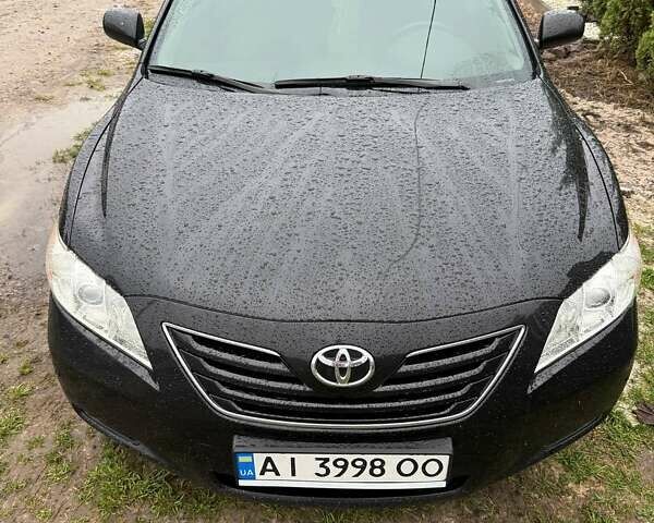 Черный Тойота Камри, объемом двигателя 2.36 л и пробегом 316 тыс. км за 8800 $, фото 1 на Automoto.ua