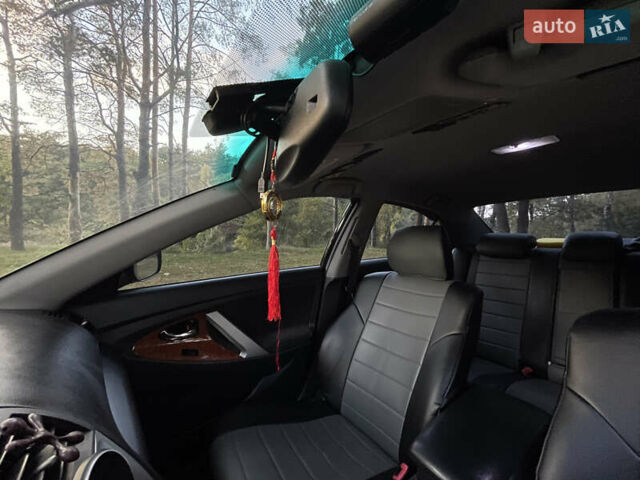 Черный Тойота Камри, объемом двигателя 2.36 л и пробегом 164 тыс. км за 8900 $, фото 24 на Automoto.ua