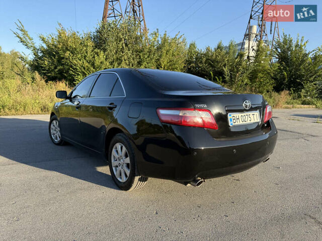 Черный Тойота Камри, объемом двигателя 3.5 л и пробегом 252 тыс. км за 9500 $, фото 2 на Automoto.ua