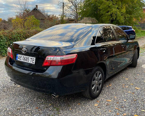 Черный Тойота Камри, объемом двигателя 3.46 л и пробегом 280 тыс. км за 8999 $, фото 1 на Automoto.ua