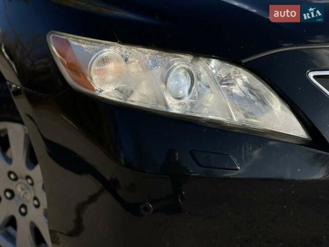 Черный Тойота Камри, объемом двигателя 2.4 л и пробегом 244 тыс. км за 8700 $, фото 10 на Automoto.ua