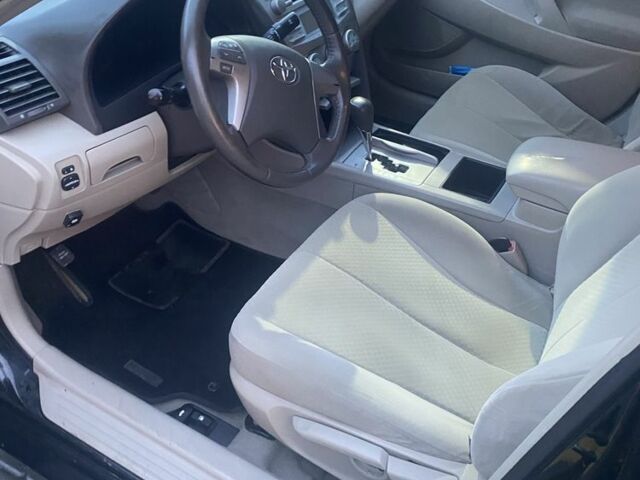 Черный Тойота Камри, объемом двигателя 2.4 л и пробегом 274 тыс. км за 7500 $, фото 7 на Automoto.ua