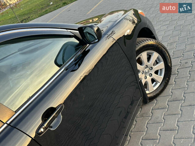 Черный Тойота Камри, объемом двигателя 2.4 л и пробегом 134 тыс. км за 11900 $, фото 24 на Automoto.ua