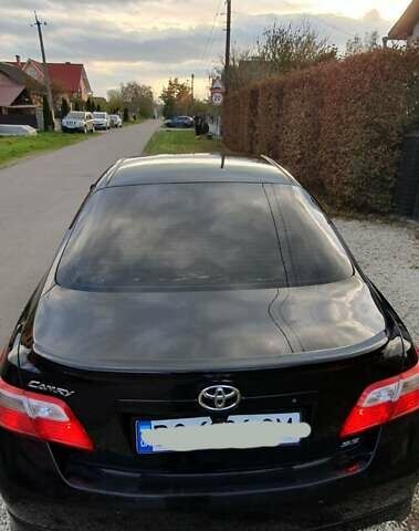 Черный Тойота Камри, объемом двигателя 2.4 л и пробегом 173 тыс. км за 7999 $, фото 3 на Automoto.ua